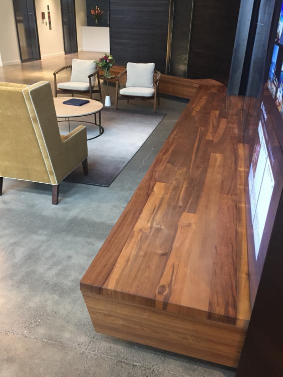Reclaimed Teak Bright seating area built into this cruise line office space