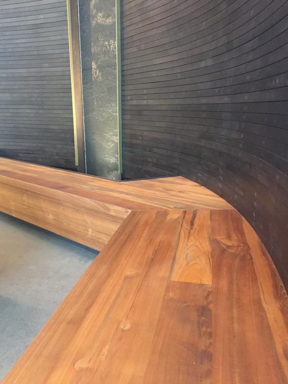 Reclaimed Teak Bright seating area built into this cruise line office space