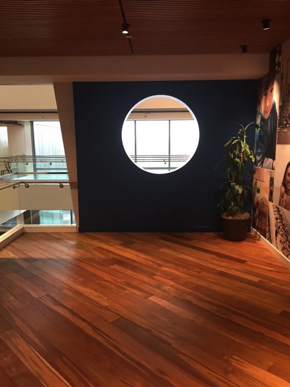 Reclaimed Teak Bright wood flooring flows throughout this cruise line's office space in Seattle, WA. 