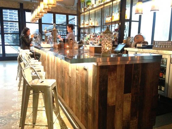 Vat Stock Patina wraps around this rooftop bar in Chicago, IL.