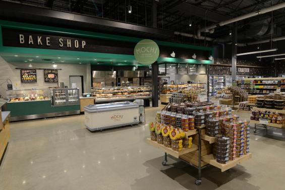 The Bake Shop sign within Whole Foods Lakeview used American Gothic Ash with a custom black finish reclaimed paneling 