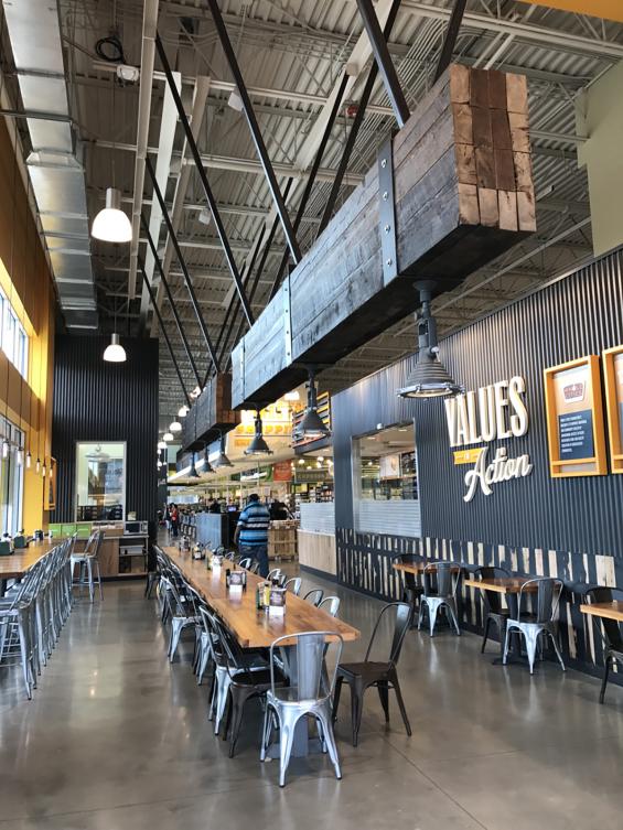 Large industrial looking lighting fixtures were created by banding together 3'x6' beams with metal strapping