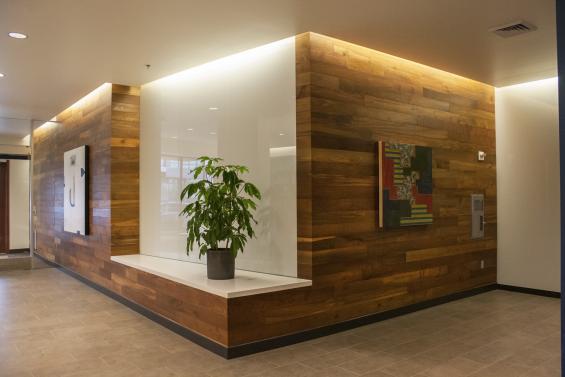 Reclaimed Teak in the lobby of The Osprey–Block 37 in Portland, OR.