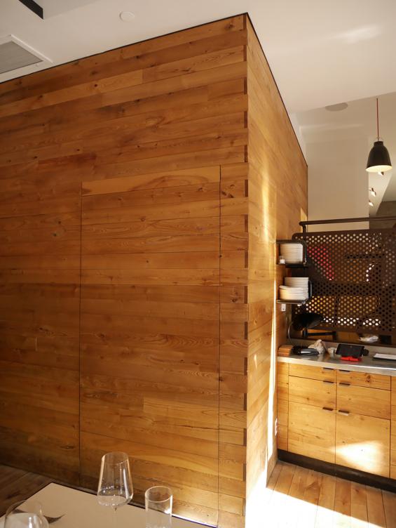 American Gothic Ash reclaimed wood used as wall paneling and built-in drawers at the server station