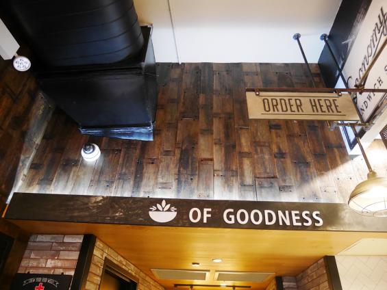 Reclaimed truck decking clads the back wall in the Sandwicherie in Union Square