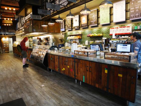 The service counter at the Sandwicherie in Union Square is paneled with Foundry Maple reclaimed wood