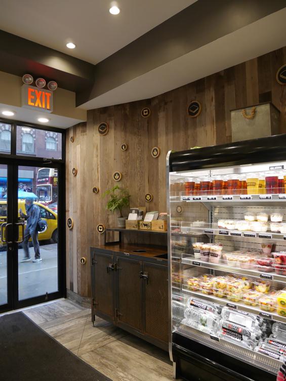 Mixed Softwoods Vat Stock Patina reclaimed from cherry vats clads the walls of the Sandwicherie location near Grand Central