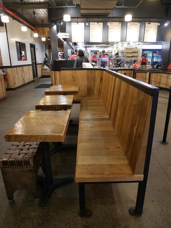 This seating area in Dos Toros Taqueria was created from Mixed Hardwoods Settlers' Plank reclaimed wood