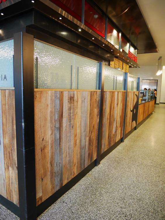 Mixed Hardwoods Settlers' Plank reclaimed wood paneling at Dos Toros Taqueria in New York City