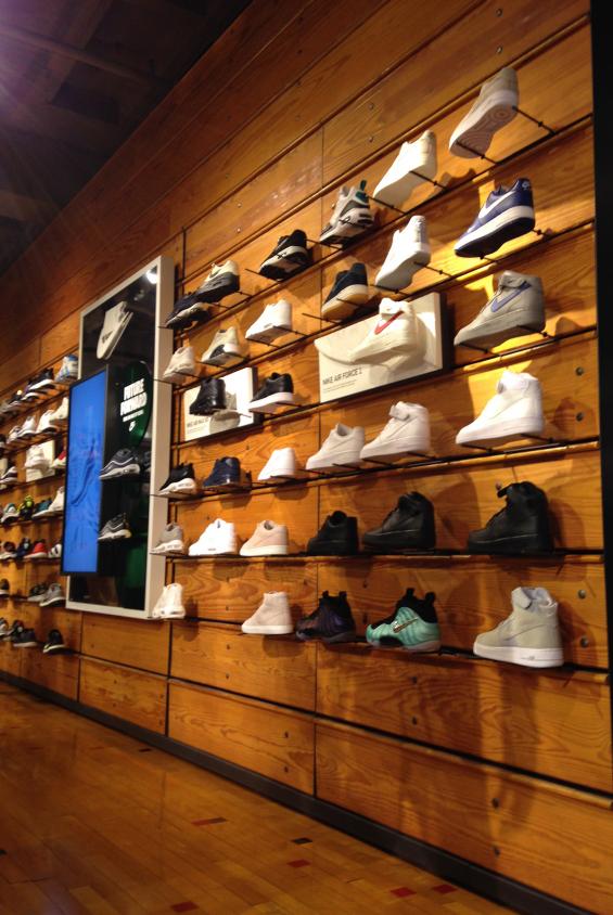 Reclaimed Bleacher Boards used as a retail display in this sporting goods store in Chicago. 