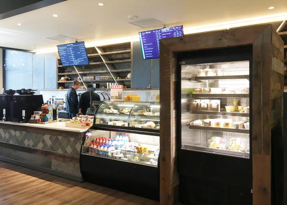 American Prairie Taphouse reclaimed paneling is featured in the grab n' go area of this college cafe.