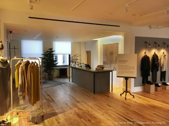 Foundry Maple Original reclaimed flooring flows throughout this design space in New York, NY. Photo by North River Architecture + Planning, PC.  