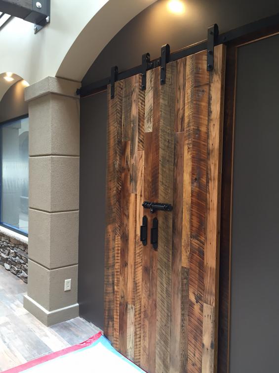 Entrance to a dance studio crafted from mixed reclaimed hardwoods.
