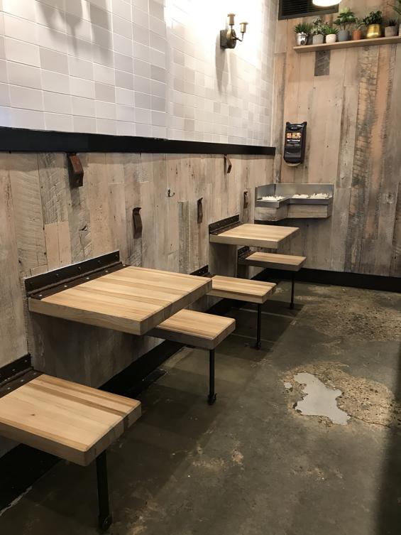 Mixed Hardwoods Settlers' Plank with a custom white wash finish is used as the wall paneling at this particular location of Dos Toros Taqueria in New York City