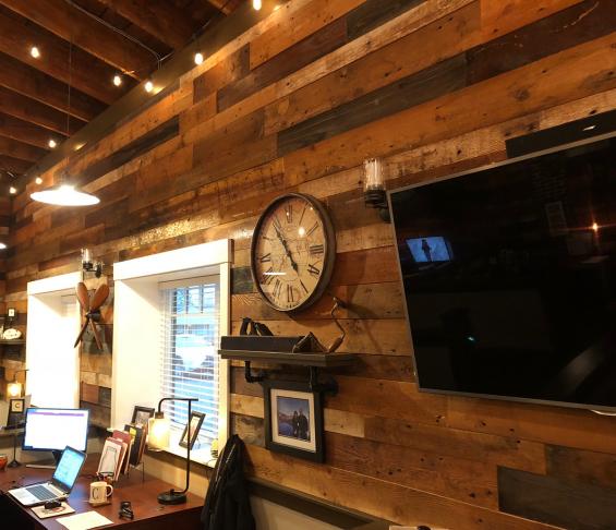 A custom blend of American Prairie Redwood, American Prairie Original Painted, and Grandma's Attic Mixed Softwoods for the paneling featured at the Fire Restoration Experts Office in Portland, OR.