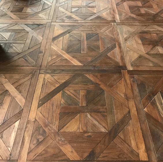 Close up of our reclaimed teak Versailles pattern panels installed in a New York Hotel.