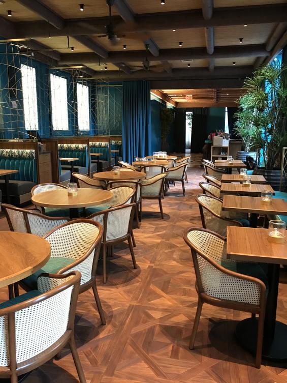 Intricate Versailles pattern panels made of Indonesian Teak featured in the Polynesian restaurant in this NYC Hotel.