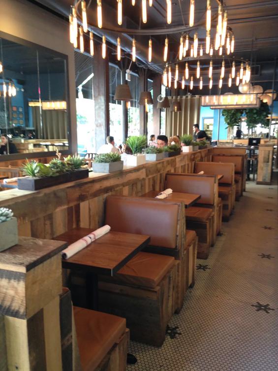 The booths in Mexicue were fabricated from our Settlers' plank reclaimed wood. 