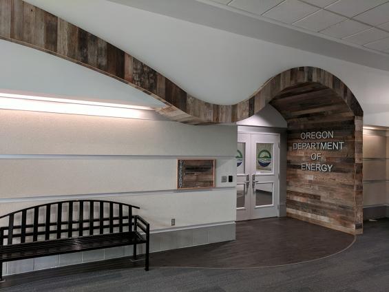 The swooping entryway to the offices of The Oregon Department of Energy, framed by reclaimed Mixed Softwoods Vat Stock