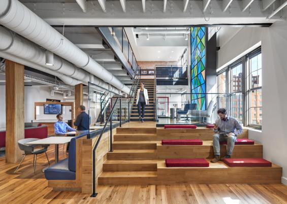 Red Hat in Boston, MA with paneling and flooring of American Gothic Oak.