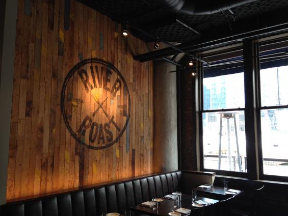 Accent wall in River Roast is crafted from reclaimed Foundry Maple paneling