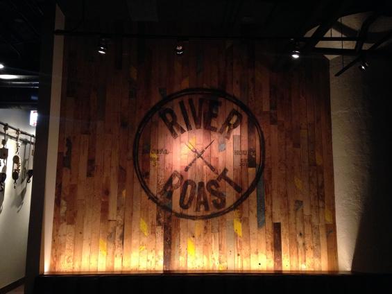 Accent wall in River Roast is crafted from reclaimed Foundry Maple paneling