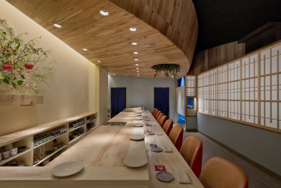 This sushi bar in New York City has American Gothic Elm ceilings and American Gothic White Oak reclaimed wood floors with a custom grey finish. Photo by Connie Zhou.