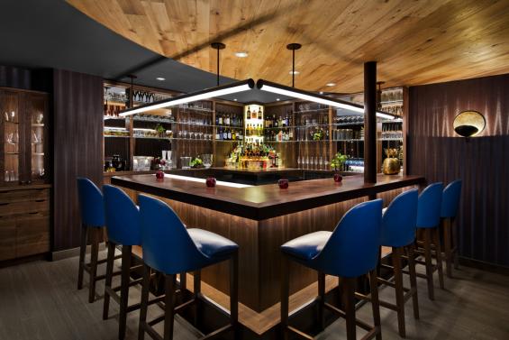 This high end bar in New York City features American Gothic Elm on the ceiling and American Gothic White Oak with a custom grey finish on the floors. Photo by Connie Zhou.