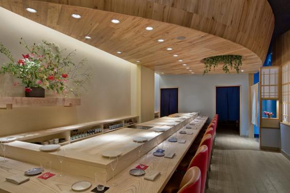 This sushi bar in New York City has American Gothic Elm ceilings and American Gothic White Oak reclaimed wood floors with a custom grey finish. Photo by Connie Zhou.