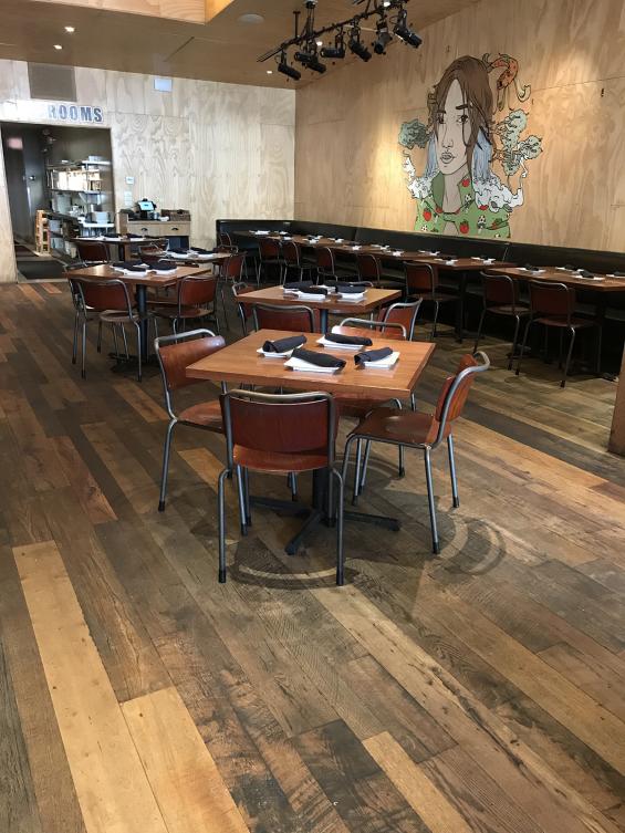 A great example of the mosaic effect created by our reclaimed Settlers' Plank Mixed hardwoods at Umami Burger in Chicago.