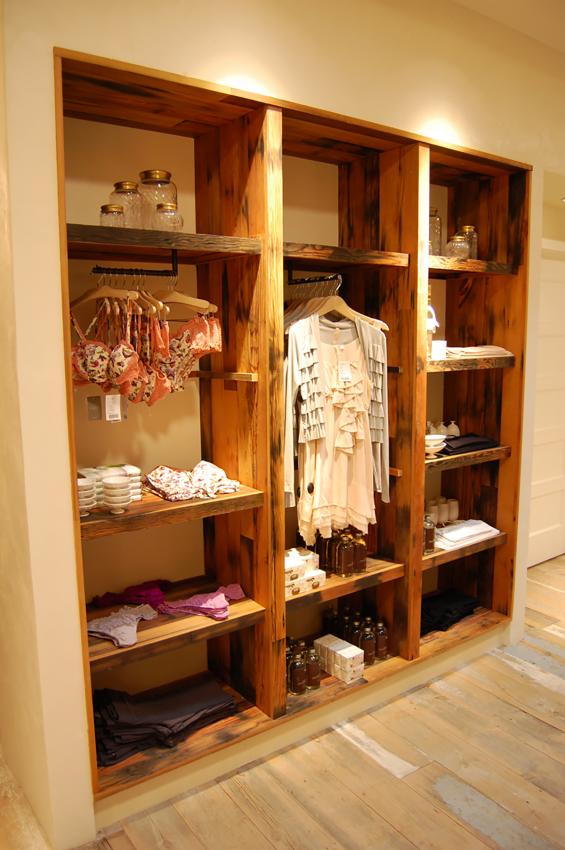 Custom built-in fixtures and shelving crafted of reclaimed vat stock by NEWwoodworks.