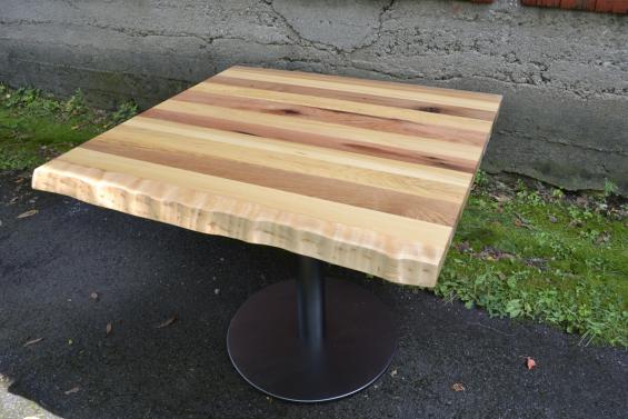 Mixed hardwoods and a live edge four top.