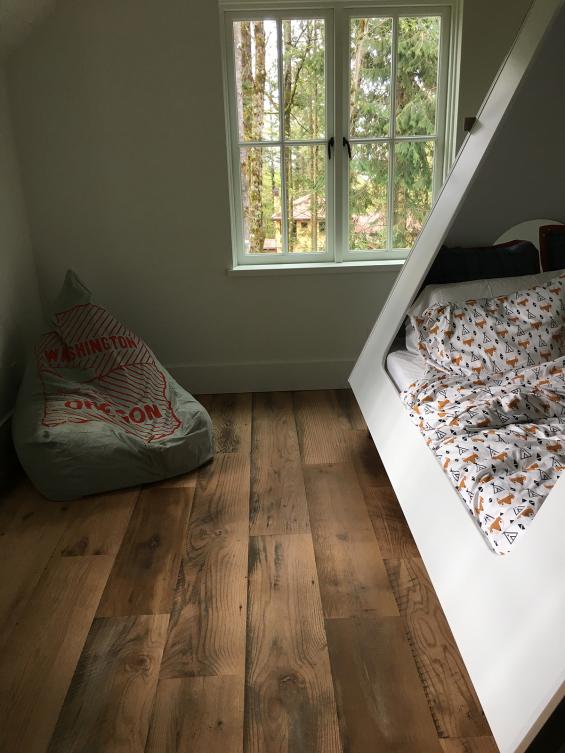 Wide 10" Settlers' Plank Mixed Oak boards were used as flooring and finished with a water-based polyurethane 