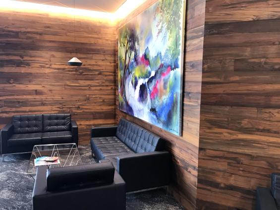 Reclaimed Indonesian Teak Bright wall paneling in an office in Federal Way, WA