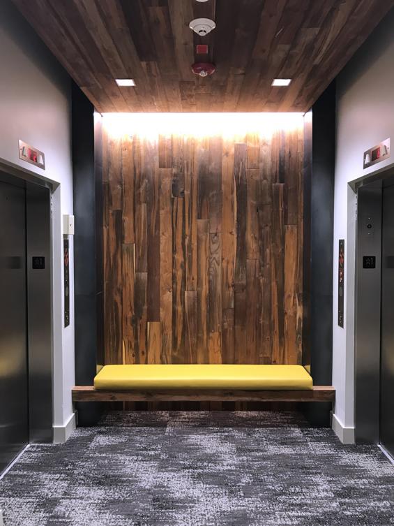 Reclaimed Indonesian Teak Bright ceiling and wall paneling in an office in Federal Way, WA
