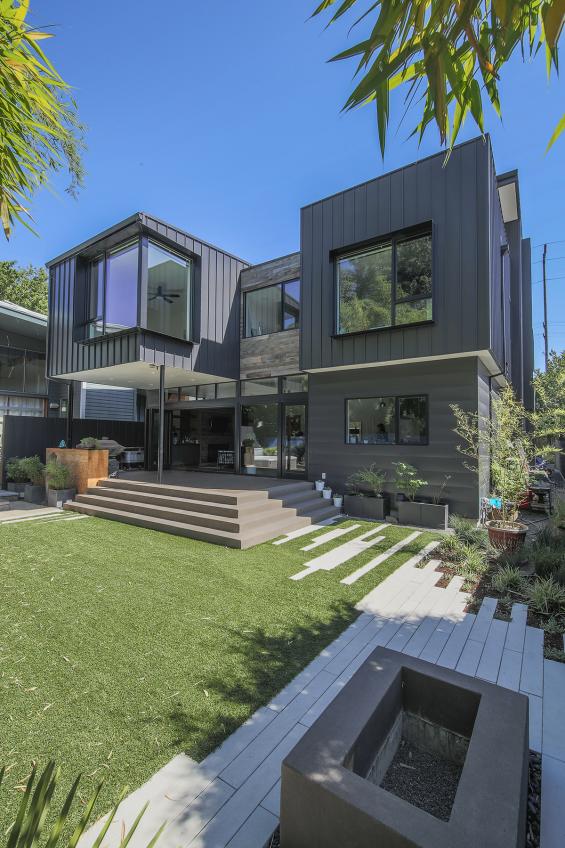 American Prairie Taphouse reclaimed wood is used as exterior siding on this Portland, OR home. Photo by KLiK Concepts. 