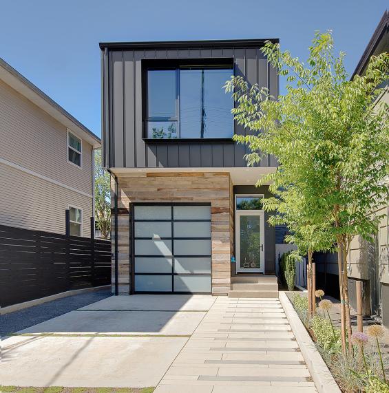 American Prairie Taphouse reclaimed wood is used as exterior siding on this Portland, OR home. Photo by KLiK Concepts. 