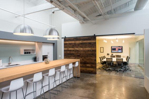 8'x8' flat track door for an office conference room using Pioneer Millworks Settlers' Plank Mixed Hardwoods