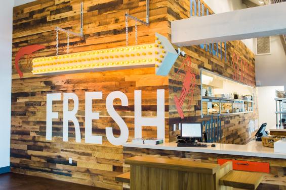 Pioneer Millworks Reclaimed Wood Settlers' Plank Wall with Engraved Words