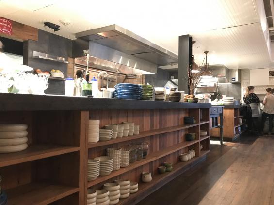 Pioneer Millworks Reclaimed Wood for shelving in a restaurant