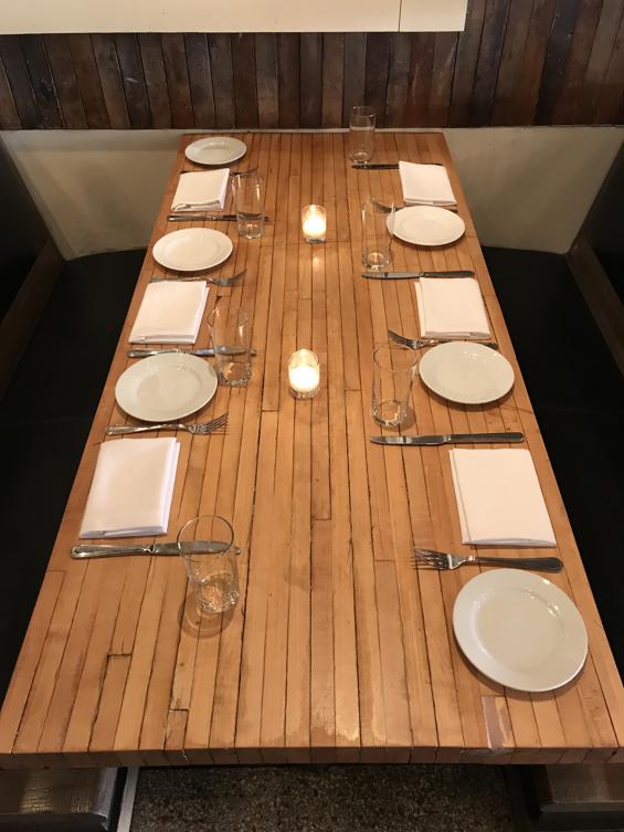 Reclaimed Bowling Alley tabletops at Saxton + Parole in New York City. 