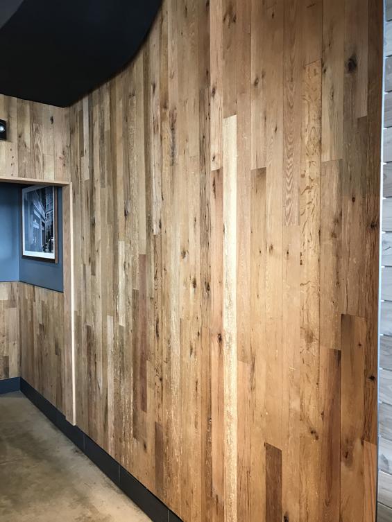 American Gothic Mixed oak reclaimed wood wall paneling in Shake Shake restaurant in Washington, DC. 