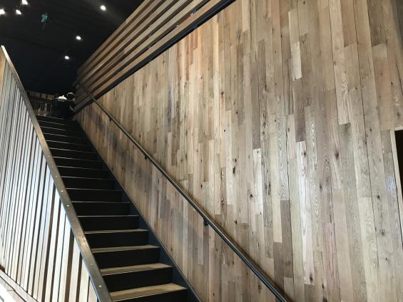 American Gothic Mixed oak reclaimed wood wall paneling in Shake Shake restaurant in Washington, DC. 