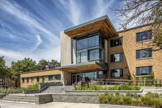 American Prairie Brown Board paneling was used on the exterior overhangs of SUNY Oswego's Waterbury Hall. Designed by King + King Architects. Photo by Revette Studio. 
