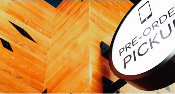 Original gym flooring arranged in a confetti pattern at the Madison Ave. location of Minigrown in New York City. 