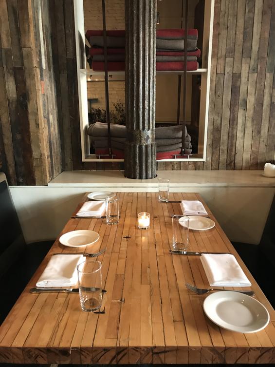 Pioneer Millworks Reclaimed Foundry Maple paneling and reclaimed bowling alley table tops