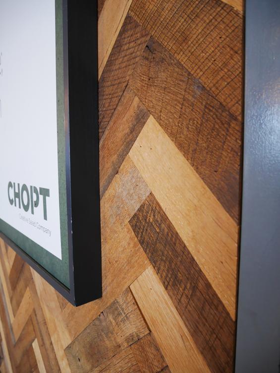 close up of mixed hardwoods settlers plank reclaimed wall paneling