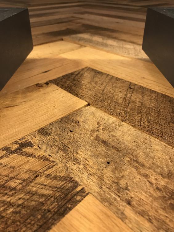 close up of mixed hardwoods settlers plank reclaimed wall paneling