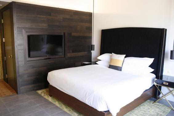 American Gothic Mixed Oak reclaimed wood wall paneling in the guest rooms of Hi-Lo Hotel in Portland, OR. 