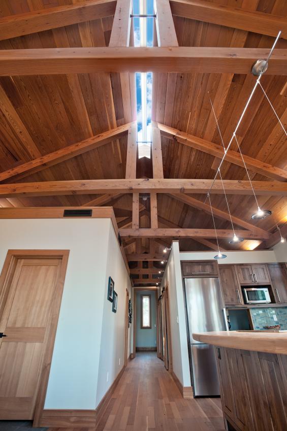 Douglas fir c-select vertical grain reclaimed wood flooring and ridgeline skylight in a home in Dayton, OR. Photo by Loren Nelson.